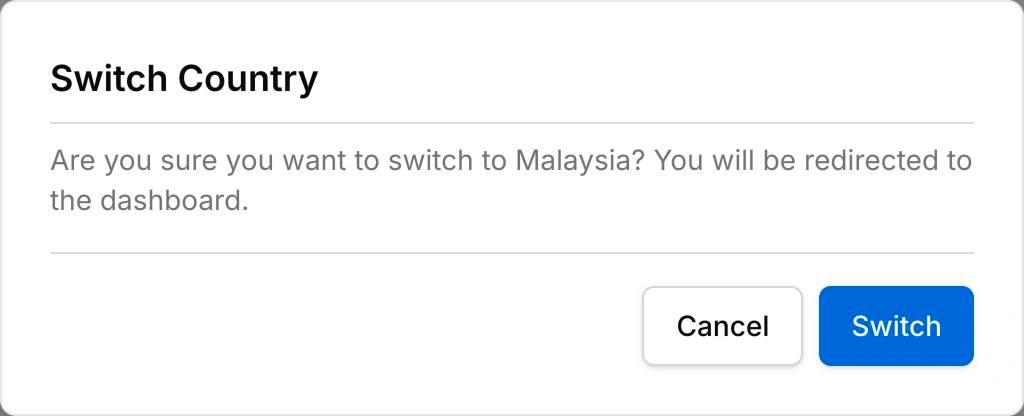 The Switch Country dialog: Are you sure you want to switch to Malaysia? You will be redirected to the dashboard. With Cancel and Switch buttons.